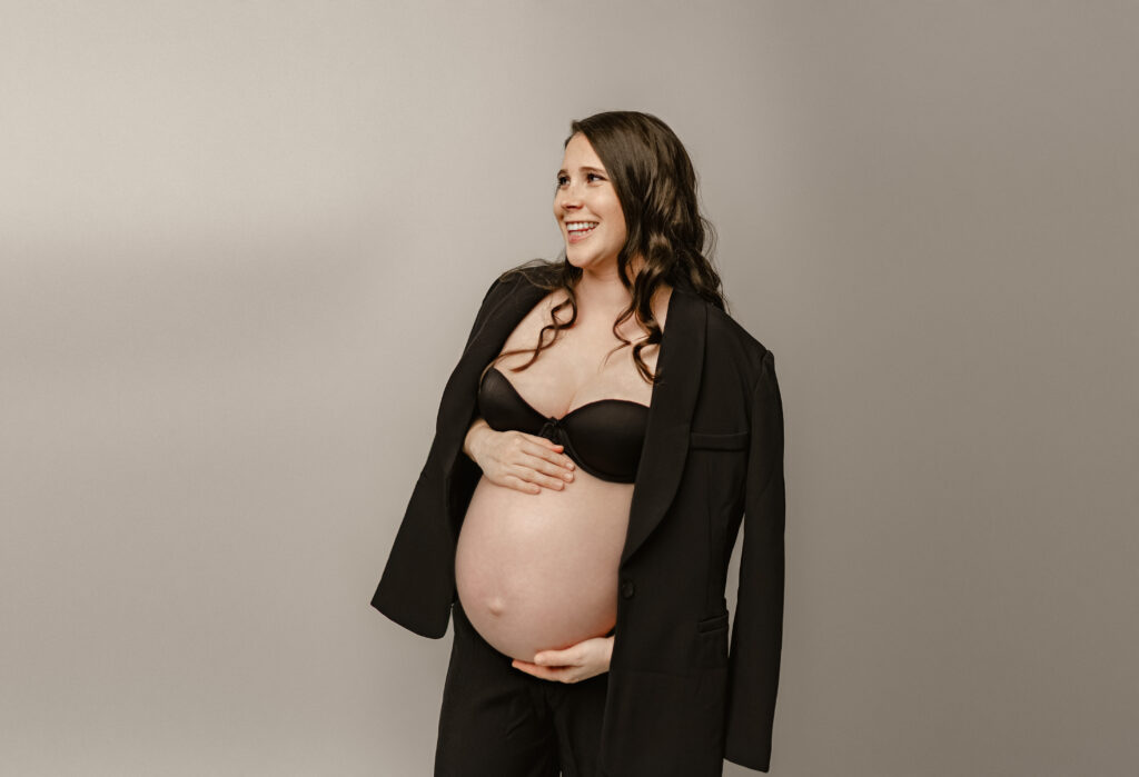 Beautiful maternity photo captured in a Maple Grove studio, serving Plymouth, Minnetonka, Wayzata, Excelsior, Chaska, and Eden Prairie mothers-to-be.

